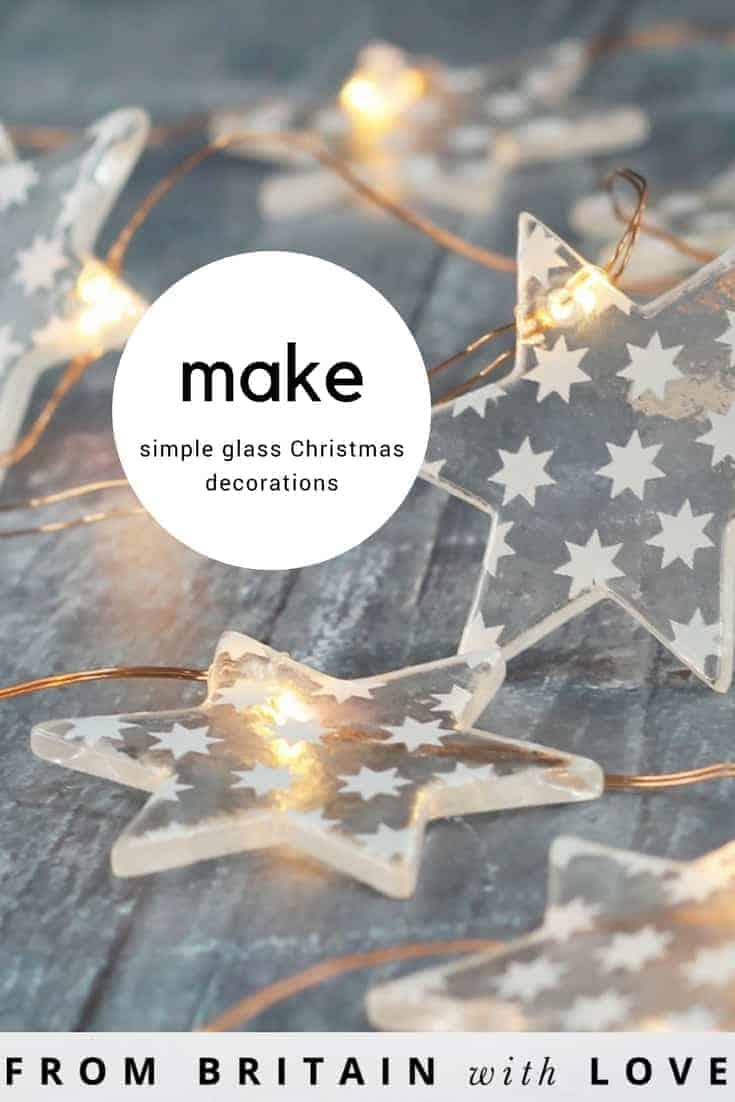 love simple glass christmas holiday decorations like these glass stars with frosting and fairy lights. Click through to find out how to make other christmas festive glass decorations and bunting