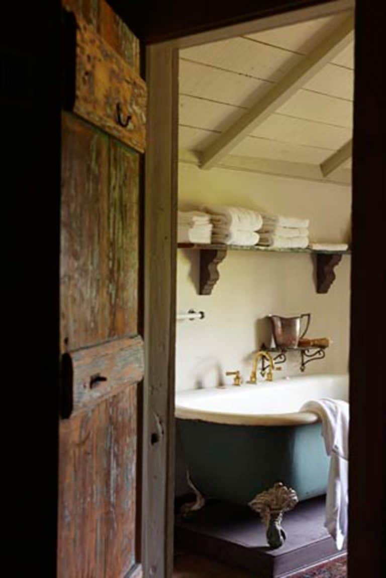love this rustic country bathroom with roll top bath, open shelves and rustic wood