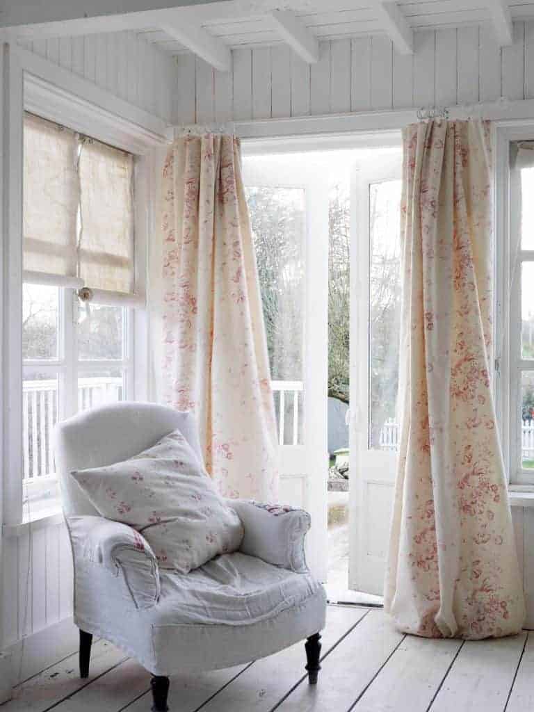love these faded floral linen curtains by cabbages and roses