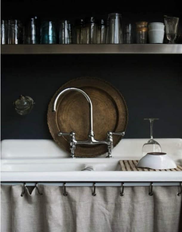 love this country kitchen with dark wall curtain below sink