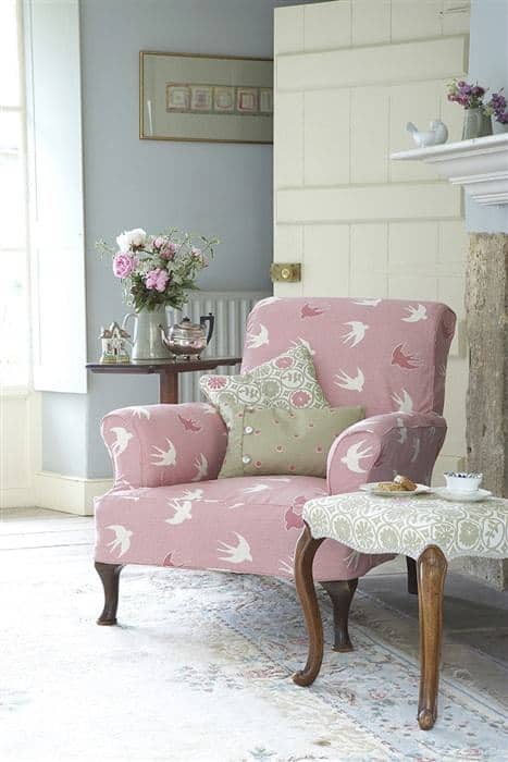 love this pretty pink faded floral fabric covered armchair by Vanessa Arbuthnott. Click through for more faded florals you'll love
