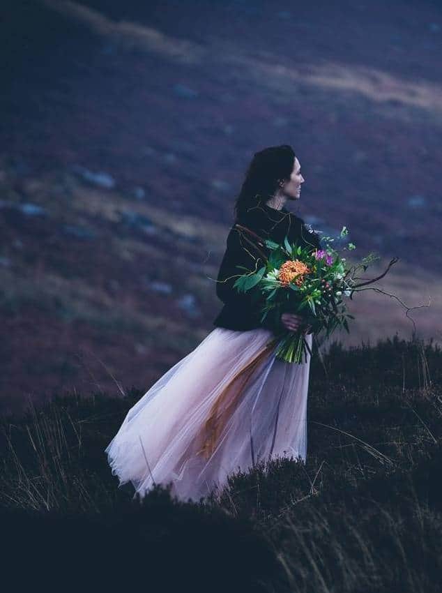 love this wild and romantic woman in landscape image by photographer Emma Davies. Click through photography tips and ideas for makers and creatives from hand-picked photographers as well as insider tried and tested ideas and contacts for great locations, stylists and online photography courses to help your photography stand out from the crowd #photographytips #creative #business #locations #photography #ideas #ayearwithmycameral