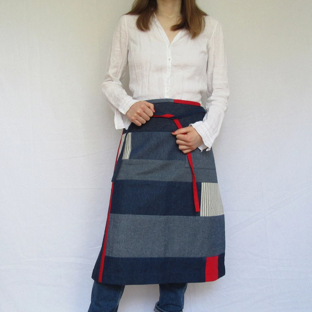 japanese boro patchwork apron handmade by in the making aprons on etsy using denim, ticking and bright red fabric remants. Zero waste and built to last and last