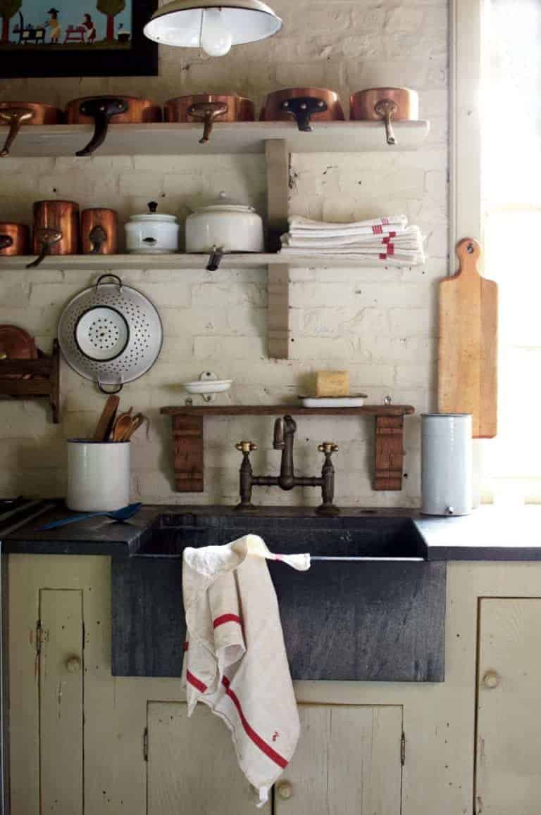 love this country rustic kitchen with open shelves, shaker cupboards and vintage enamel and wood. Click through for more rustic interiors ideas you'll love