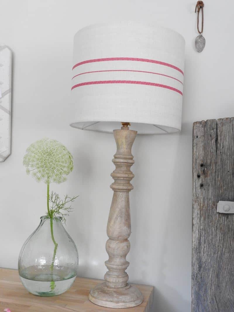 love this handmade linen red stripe shade by Peony & Sage. Click through to find out more and to discover other beautiful linen lampshades made in the UK that you'll love