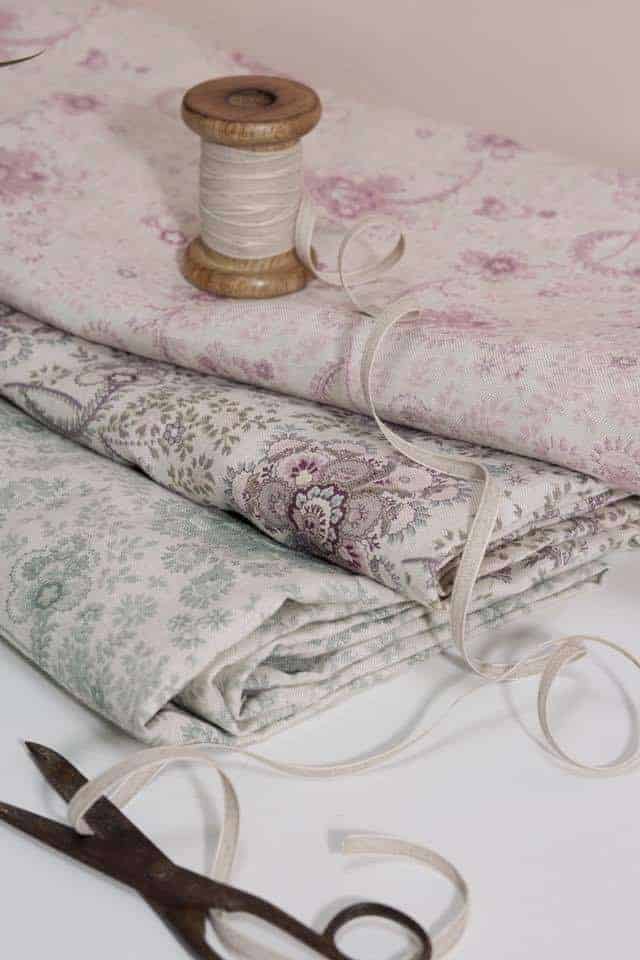 love these faded floral fabrics - soft linens in pale pinks, blues and greys by Olive + Daisy. Click through for more faded floral fabrics you'll love