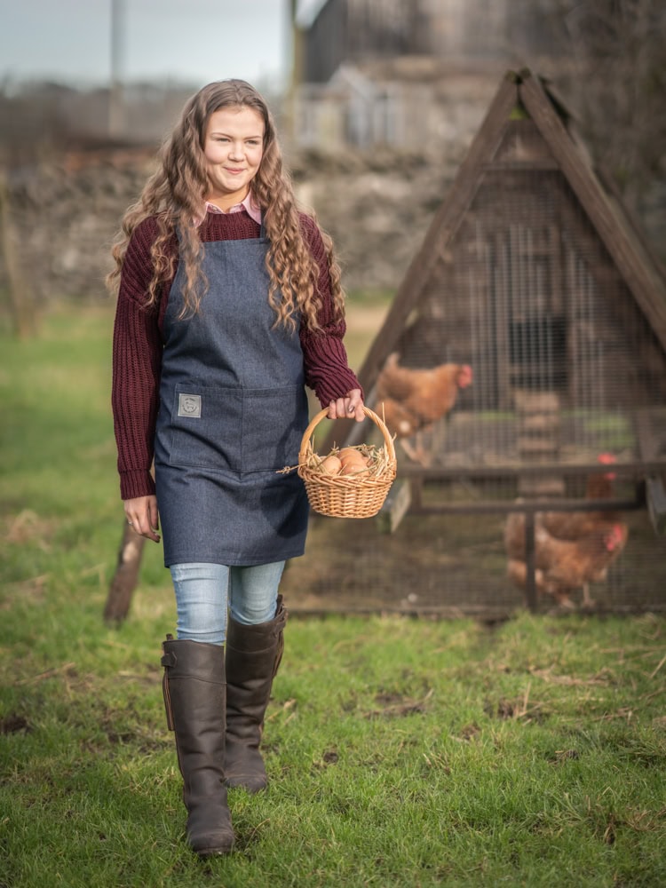 handmade soft denim cross back apron from Dodgson Wood based in The Lake District