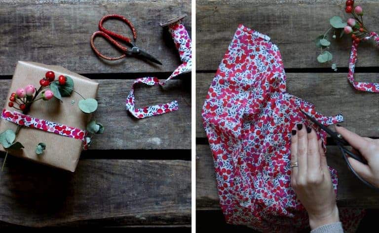 love this idea for making liberty fabric ribbon for christmas gift wrap with kraft brown paper and fresh berries and foliage. Click through for more ethical eco-friendly and plastic free christmas gift wrapping ideas you'll love to try