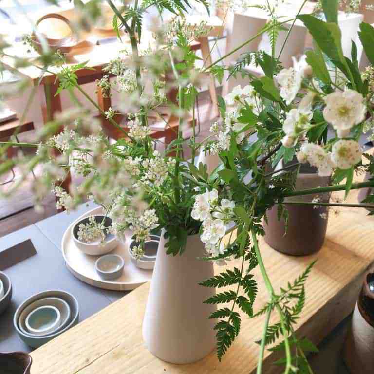 Spring flowers and ceramics at Snug Gallery Hebden Bridge in bronte country yorkshire - one of the simple pleasures and local loves of Sarah Statham, founder of Simply by Arrangement flowers in Hebden Bridge. Click through to discover Sarah's other wonderful local loves #haworth #yorkshire #brontecountry #frombritainwithlove
