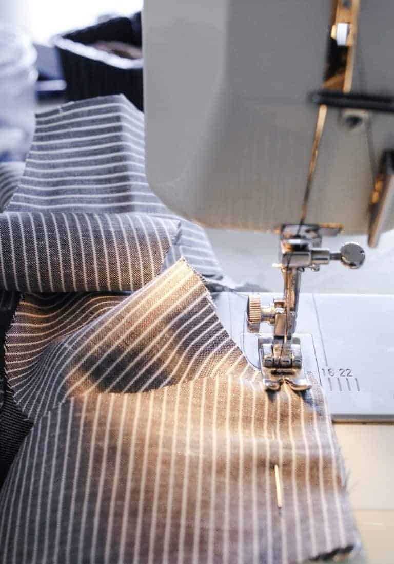 learn how to make a cross back apron dress with simple step by step DIY pattern tutorial - join me on the sewing workshop with Dolly in Lewes where I share my step by step images and tips from Diana Uprichard, founder of Dolly - handmade clothes, patterns and workshops to help real women make and wear clothes that feel good and will last #aprondress #crossback #howtosew #pattern #sewingworkshop #japanesecrossbackapron #frombritainwithlove #sewingtutorials #learntosew #sustainablefashion