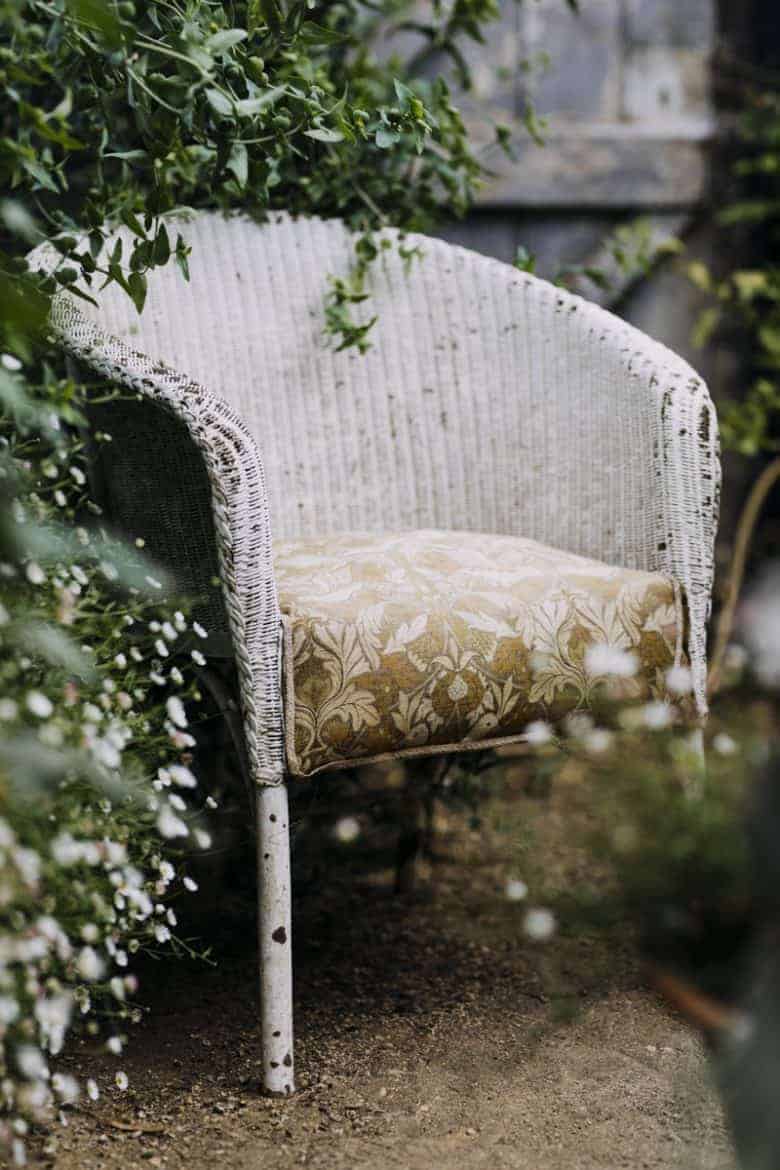 garden chair vintage wicker - flower photography tips and ideas from photographer Eva Nemeth including expert tips on how to create depth of field, work with light, texture, aperture and f stops to take beautiful flower and garden photographs #flowerphotography #photography #tips #frombritainwithlove #garden #chair