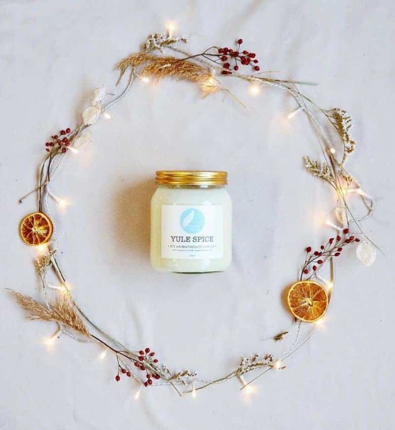 handmade yule aromatherapy christmas candle by ethical beauty brand Corinne Taylor of Brighton. handmade christmas gift ideas for women made in Britain. Click through to discover other special ideas linen aprons, hand knits, personalised notebooks, baubles, hand-crafted jewellery, ethical natural beauty and more #handmadegifts #giftsforwomen #frombritainwithlove #madeinbritain #christmas gifts