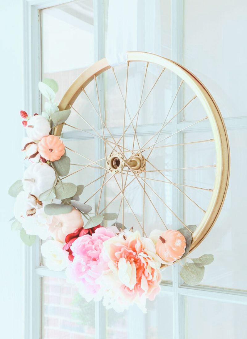make a bicycle wheel flower wreath