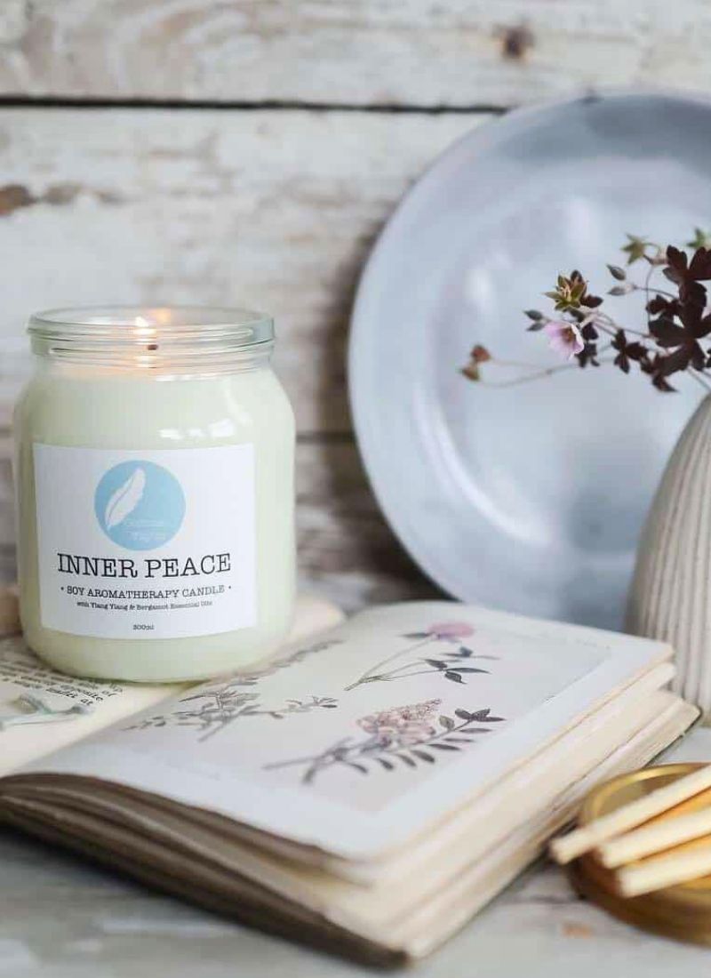 soy aromatherapy candle handmade in brighton by aromatherapist corinne taylor using pure essential oils of rose geranium, patchouli and tangerine to bring relaxation, comfort and joy
