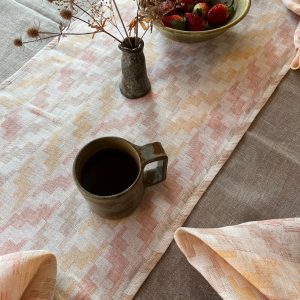 linen table runner made in england in spring sorbet colours by lemuel mc using ethically sourced pure linen