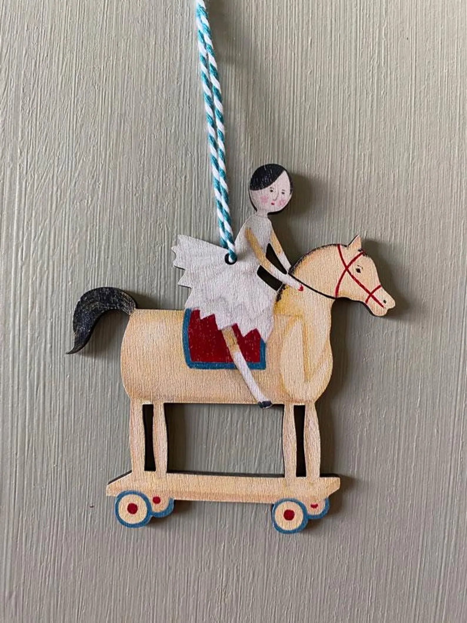 peg doll on horse hanging wooden christmas tree decoration by elizabeth harbour