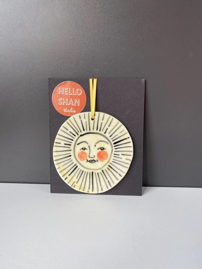 smiling face sun ceramic handmade wall decoration by shan studio