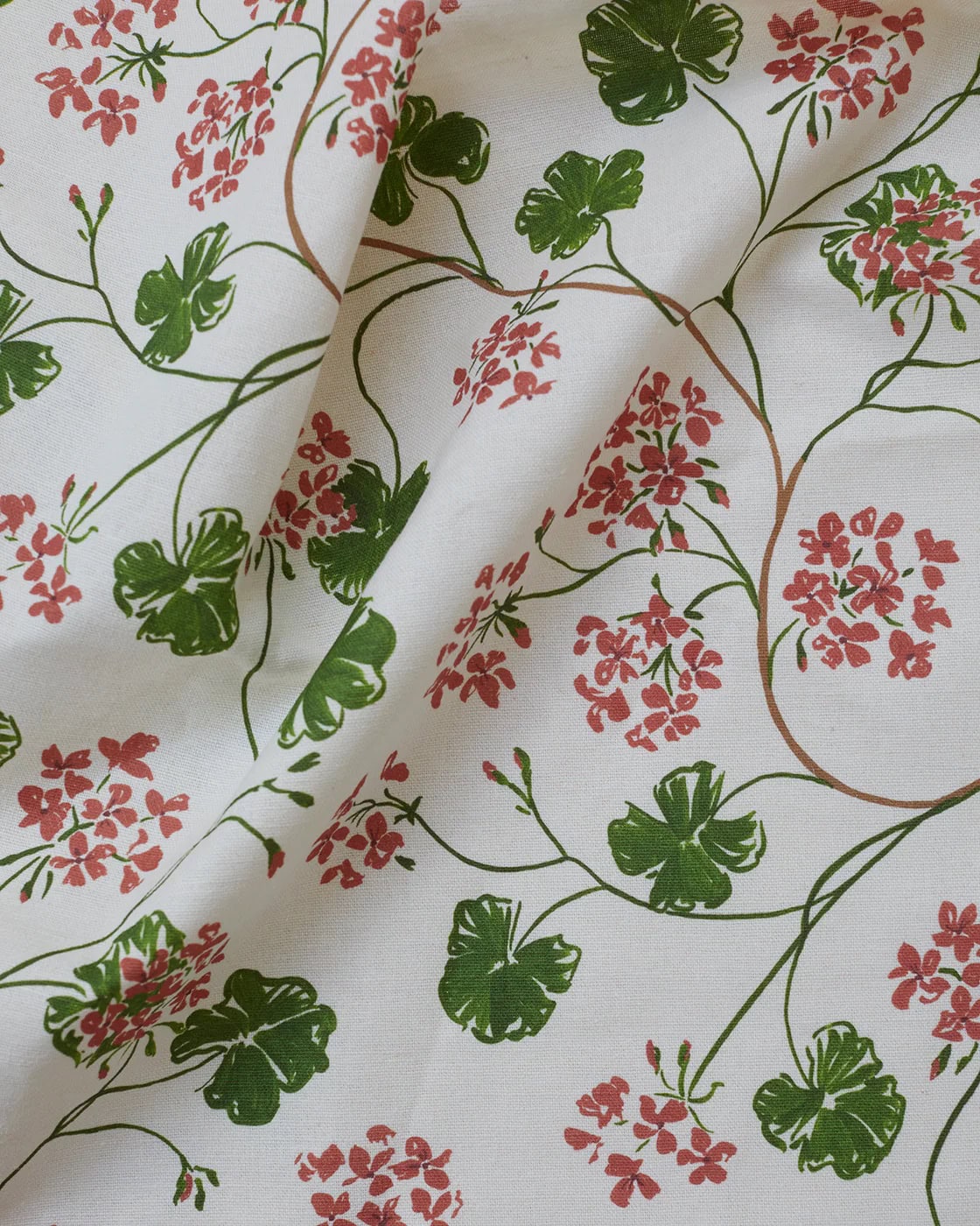 geraniums linen upholstery fabric by sophie harpley made in england from her original hand painted designs n pink and green