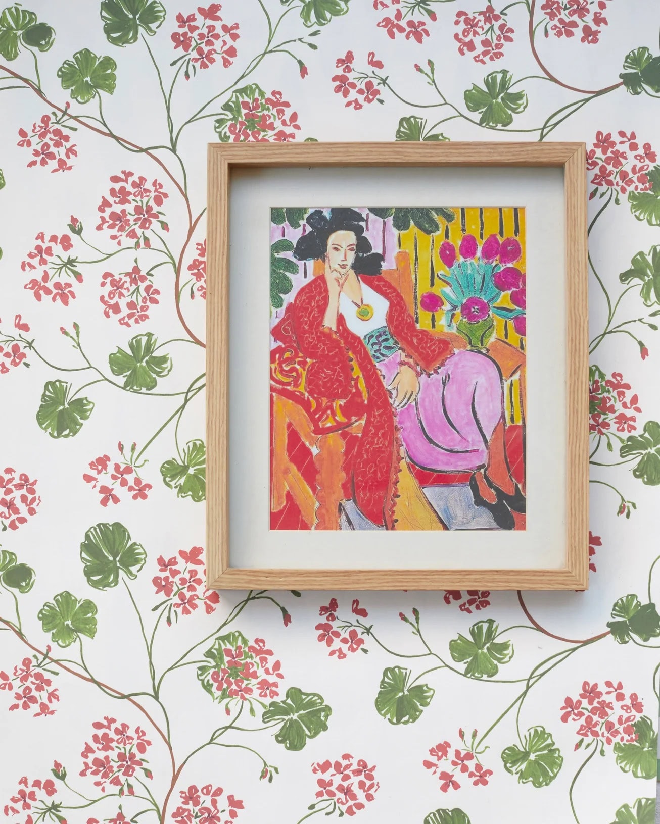 geraniums wallpaper sustainably made in england from artist sophie harpley's original hand painted design in pink and green and bringing the beauty of the geranium to your home decorating