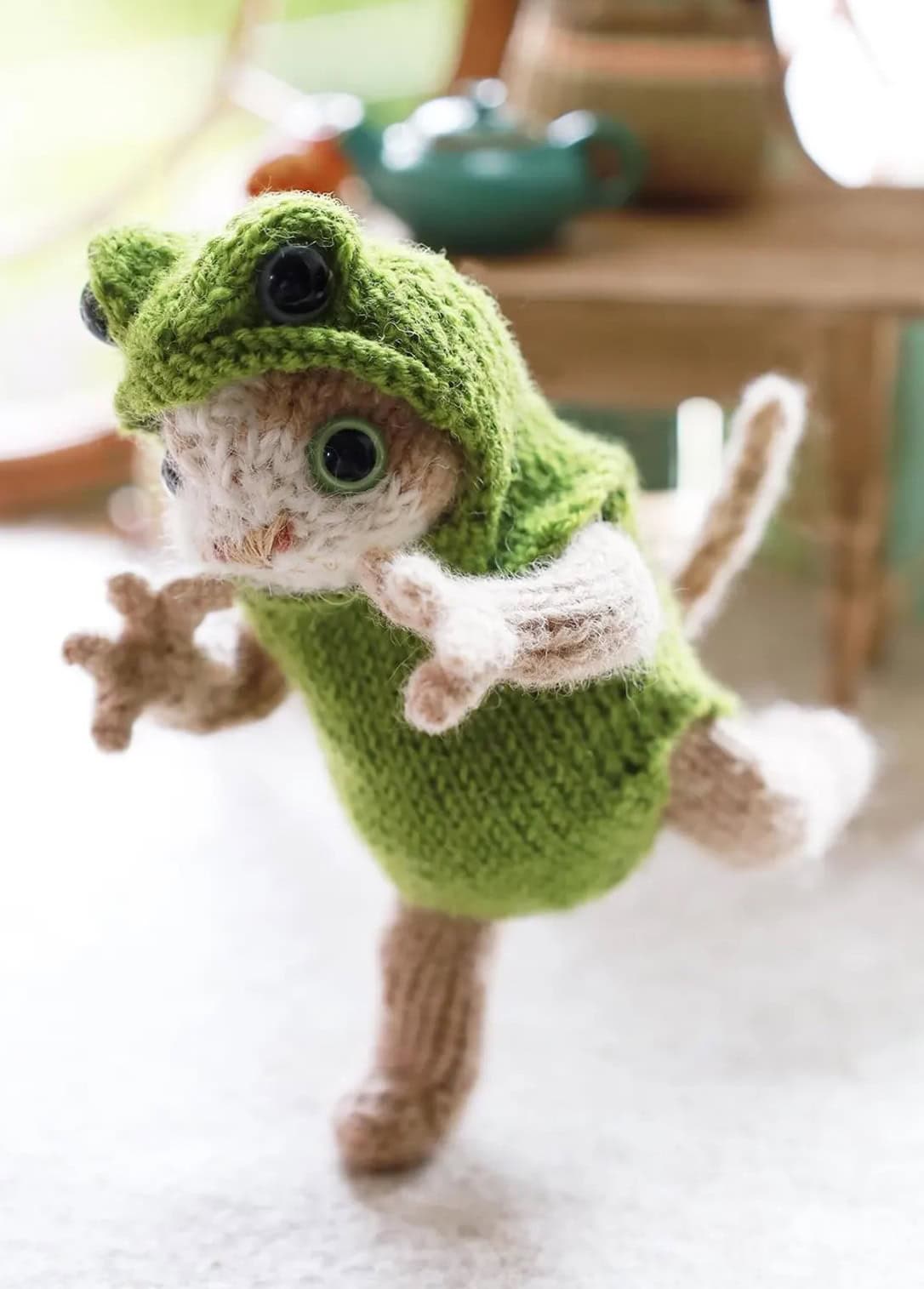 kitten in frog suit soft toy knitting pattern by claire garland aka dot pebbles knits
